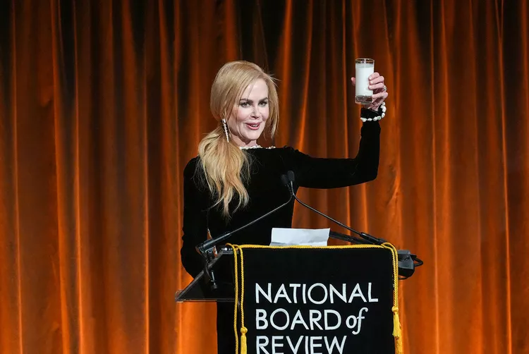 Nicole Kidman Chugs a Glass of Milk before a group of people While Enduring an Award for ‘Babygirl’